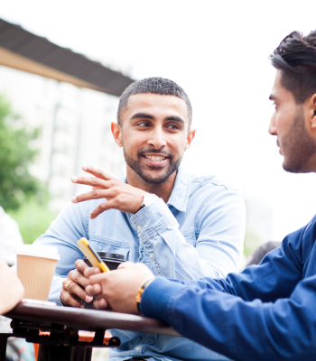 Young professionals discussing how to promote organ donation awareness